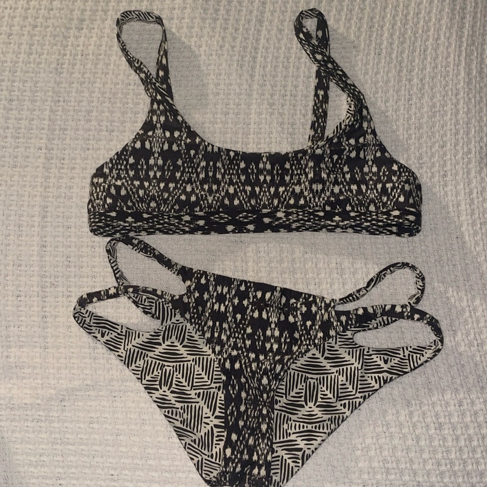 Barely worn two piece bathing suit, reversible